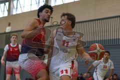 Basketball Bayernliga Herren - Saison 2026/27 - PSV Ingolstadt - TSV Milbertshofen - Göbel Fabian rot Milbertshofen - Weiß Jeremias weiss Ingolstadt - Foto: Meyer Jürgen