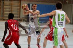 Basketball WestPark Baskets Ingolstadt - TSV München - M.Brüggemann weiß mit Ball - Sebastian Ebner #13 Ingolstadt - Foto: Jürgen Meyer