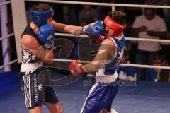 Ingolstädter Boxnacht - Fronte79 - Box-Club Ingolstadt vs. Auswahl München - roter Helm Magomed Schachidov gegen blau Viktor Winkert (BCI)