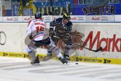 DEL - ERC Ingolstadt - Eisbären Berlin - Brandon Buck im Zweikampf an der Bande. Foto: Adalbert Michalik