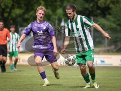 Landesliga - Freundschaftsspiel - Saison 2026/27 - SV Manching - TSV Karteth-Lappersdorf - Daniel Schweiger (Nr.11 - SV Manching) - Fritz Lukas lila Kareth - Lappersdorf  - Foto: Meyer Jürgen