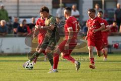 Toto - Pokal - Saison 2024/25 - TSV Lohr - FC Ingolstadt 04 - Tim Heike (Nr.9 - FCI) - Ege Celiker (Nr.4 - TSV Lohr) - Foto: Meyer Jürgen