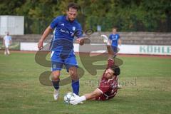A-Klasse -  Saison 2026/27 - DJK Ingolstadt - TSV Mailing/Feldkirchen - Markus Käser blau DJK Ingolstadt  - Marco Ernhofer TW Mailing hält den Ball - Foto: Meyer Jürgen