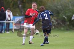 Kreisliga - Saison 2025/26- SV Hundszell - TV Münchsmünster - Lucas Konradi rot Hundszell - Johannes Artmeier blau Münchsmünster - Foto: Meyer Jürgen
