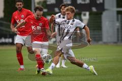 Bayernliga Nord - Saison 2026/27 - FC Ingolstadt 04 II - ASV Cham - Manuel Distl (Nr.9 - FCI II) - Simon Haimerl rot Cham - Foto: Meyer Jürgen