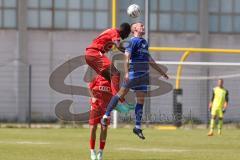 Bayernliga Nord - Saison 2023/2024 - FC Ingolstadt 04 - Würzburger FV 04 - Nduka Donald rot FCI - Hock Fabio blau Würzburg - Foto: Meyer Jürgen