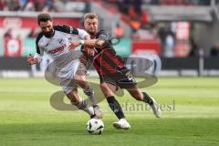 3. Liga; FC Ingolstadt 04 - SC Verl; Zweikampf Kampf um den Ball Mikic Daniel (4 SCV) Yannick Deichmann (20, FCI)