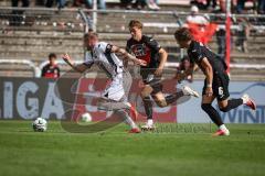 3. Liga - Saison 2026/27 - Victoria Köln - FC Ingolstadt 04  - Lars Lokotsch (Nr.13 - FCI) - Tim Kloss (Nr.18 - Viktoria Köln) - Tobias Eisenhut (Nr.6 - Viktoria Köln) - Foto: Meyer Jürgen