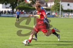 Kreisliga - Saison 2025/26- TSV Kösching - FC Mindelstetten - Sebastian Schneeberger rot Kösching - Jonas Schoberer blau Mindelstetten - Foto: Meyer Jürgen