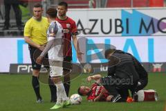 3.Liga - Saison 2022/2023 - FC Ingolstadt 04 -  - FC Freiburg II - Rico Preissinger (Nr.6 - FCI) verletzt am Boden - Foto: Meyer Jürgen