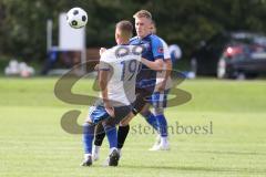 Kreisliga - Saison 2023/2024 - SV Menning - FC Mindelstetten - Marcel von Schuttenbach blau Menning - Jonas Greth weiss Mindelstetten - Foto: Meyer Jürgen