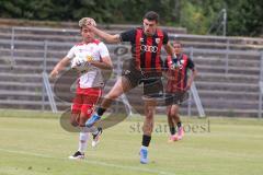 *** Bayernliga Nord - Saison 2025/26 - FC Ingolstadt 04 II - Jahn Regensburg II - Ognjen Draculic (Nr.9 - FC Ingolstadt II) - Luong Thanh weiss Regensburg - Foto: Meyer Jürgen