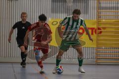 Lotto Bayern Hallencup - Saison 2024/25 - Türkisch SV Ingolstadt - SV Manching - Finale - Daniel Schweiger grün Manching - Ahmet Altay rot Türkisch - Foto: Meyer Jürgen