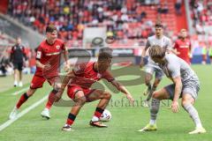 3. Liga; FC Ingolstadt 04 - SSV Jahn Regensburg; Zweikampf Kampf um den Ball Marcel Costly (22, FCI) Strauss Felix (4 SSV) Frederik Christensen (11, FCI)