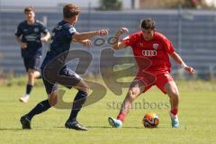 A - Junioren Bundesliga -  Saison 2023/2024 - FC Ingolstadt 04 - FSV Mainz 05 - Ognjen Draculic rot FCI - Jason Amann Mainz - Foto: Meyer Jürgen