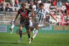 3. Liga - Saison 2026/27 - Victoria Köln - FC Ingolstadt 04  - Tim Kloss (Nr.18 - Viktoria Köln) - Fredrik Carlsen (Nr.8 - FCI) - Foto: Meyer Jürgen