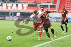 3. Liga; FC Ingolstadt 04 - Rot-Weiss Essen; Zweikampf Kampf um den Ball Linus Rosenlöcher (19, FCI) Hofmann Jannik (37 RWE)