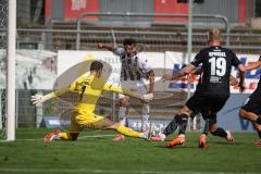 3. Liga - Saison 2026/27 - Victoria Köln - FC Ingolstadt 04  - Torwart Arne Schulz (Nr.1 - Viktoria Köln) - Fredrik Carlsen (Nr.8 - FCI) - Foto: Meyer Jürgen