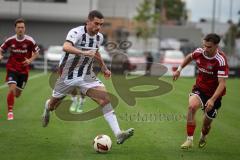 Saison 2026/27 - Freundschaftsspiel - 1. FC Nürnberg - FC Ingolstadt 04 - Ognjen Drakulic (Nr.30 - FCI) - Andrea Ceresoli (Nr.14 - FCN) - Foto: Meyer Jürgen