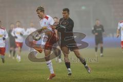 3. Liga; SSV Jahn Regensburg - FC Ingolstadt 04; Zweikampf Kampf um den Ball Marcel Costly (22, FCI) Seidel Nick (33 SSV)