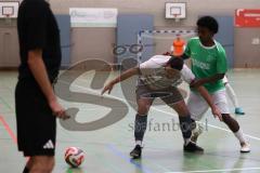 Hallenturnier Ingolstadt Nord - Saison 2024/25 - MBB SG MAnching - FC Fatih Ingolstadt  - Faniel Brhane grün Fatih  - Ali Erbas  weisss Manching - Foto: Meyer Jürgen