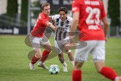 Bayernliga Nord - Saison 2026/27 - FC Ingolstadt 04 II - ASV Cham - Can Paylan (Nr.6 - FCI II) - Lukas Leutner rot Cham - Foto: Meyer Jürgen