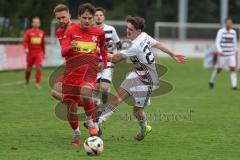 Kreisliga - Saison 2025/26- TSV Kösching - SV Kasing - David Ostermeier links rot Kösching - Valentin Hafner rot mitt Kösching - Marius Magdic weiss Kasing - Foto: Meyer Jürgen