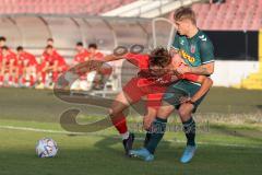 Bayernliga Nord - Saison 2023/2024 - FC Ingolstadt 04 - SSV Jahn Regensburg - Moritz Wiezorrek (Nr.15 - FCI U21) - Luis Bezjak grün Regensburg - Foto: Meyer Jürgen