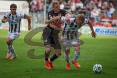 3. Liga - Saison 2026/27 - Victoria Köln - FC Ingolstadt 04  - Lars Lokotsch (Nr.13 - FCI) - Meiko Sponsel (Nr.19 - Viktoria Köln) - Foto: Meyer Jürgen
