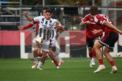Saison 2026/27 - Freundschaftsspiel - 1. FC Nürnberg - FC Ingolstadt 04 - Emre Gül (Nr.5 - FCI) - Javier Fernandez (Nr.8 - FCN) - Foto: Meyer Jürgen