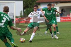 Bezirksliga - Saison 2024/25 - SV Manching - TSV Jetzendorf - Sebastian Graßl (Nr.10 - SV Manching) - Leif Schirmacher weiss Jetzendorf - Foto: Meyer Jürgen