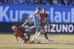3. Liga; FC Hansa Rostock - FC Ingolstadt 04; Zweikampf Kampf um den Ball Max Plath (14 FCI) Haugen Sigurd (18 HR) Simon Lorenz (32, FCI)