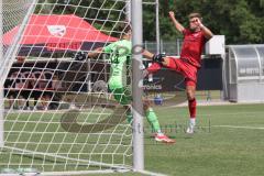 * Testspiel - Saison 2025/26 - FC Ingolstadt 04 - SpVgg Bayreuth - Yannick  Deichmann (Nr.20 - FC Ingolstadt 04) mit einem Tor - jubel -  - Torwart Maurice Dehler (Nr.34 - SpVgg Bayreuth) - Foto: Meyer Jürgen
