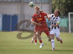 Bayernliga Nord - Saison 2026/27 - FC Ingolstadt 04 II - Jahn Regensburg II - Fabio Riedl (Nr.24 - FCI II) - Raphael Steudtner rot Regensburg - Foto: Meyer Jürgen