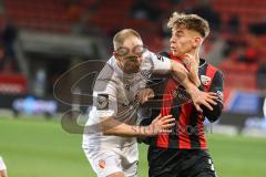 3. Liga; FC Ingolstadt 04 - Energie Cottbus; Zweikampf Kampf um den Ball Hasse Tobias (14 ECO) Max Plath (14 FCI)