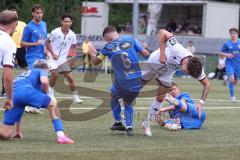 Toto - Pokal - Saison 2024/25 - DJK Hein - FC Ingolstadt 04 -  - Agon Jashari (Nr.6 - DJK Hain) - Tim Heike (Nr.9 - FCI) - Markus Horr (Nr.5 - DJK Hain) am Boden - XXXXX - Foto: Meyer Jürgen