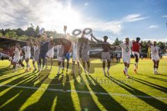 Toto-Pokal Finale; Würzburger Kickers - FC Ingolstadt 04; nach dem Spiel Sieg Jubel Freude Pokalsieg 1:2, Spieler bedanken sich bei den Fans. Tobias Schröck (21, FCI) am Megaphon und Pokal in der Fankurve