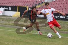 *** Bayernliga Nord - Saison 2025/26 - FC Ingolstadt 04 II - Jahn Regensburg II - Can Paylan (Nr.13 - FC Ingolstadt II) - Seibold Jakob weiss Regensburg - Foto: Meyer Jürgen