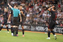 3. Liga - Saison 2025/26 - VFB Stuttgart II - FC Ingolstadt 04  - Lukas Fröde (Nr.34 - FC Ingolstadt 04) mit der Entscheidung des Schiedsrichter nicht einverstanden - Mads Borchers (Nr.9 - FC Ingolstadt 04) - Foto: Meyer Jürgen