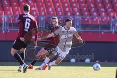 Testspiel; 1. FC Nürnberg - FC Ingolstadt 04 - Zweikampf Kampf um den Ball Stefanos Tzimas (9 FCN) Lukas Fröde (34, FCI) Flick Florian (6 FCN)