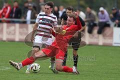 Kreisliga - Saison 2025/26- TSV Kösching - SV Kasing - Marius Magdic weiss Kasing - Johannes Tannwitz rot Kösching - Foto: Meyer Jürgen