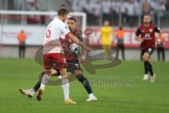 Toto-Pokal - Saison 2023/2024 - FC Ingolstadt 04 - Jahn Regensburg - Benedikt Saller (Nr.6 - Regensburg) - Pascal Testroet (Nr.37 - FCI) - Foto: Meyer Jürgen