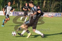 Bezirksliga - Saison 2025/26 - TSV Ober./Unterhaunstadt - VFR Garching - Tarik Ahmetovic (Nr.20 - TSV Ober-/Unterh.stadt) - Dominik Eisel schwarz Garching - Foto: Meyer Jürgen
