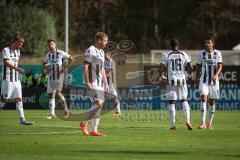3. Liga - Saison 2026/27 - Victoria Köln - FC Ingolstadt 04  - Enttäuschte Gesichter nach dem 0:3 Treffer - Lars Lokotsch (Nr.13 - FCI) - Joseph Ganda (Nr.16 - FCI) - Fredrik Carlsen (Nr.8 - FCI) - Foto: Meyer Jürgen