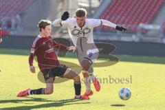 Testspiel; 1. FC Nürnberg - FC Ingolstadt 04 - Zweikampf Kampf um den Ball Jander Caspar (20 FCN) Benjamin Kanuric (8, FCI)