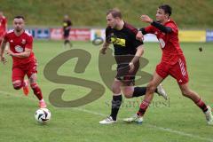 Kreisliga - Saison 2024/25- SV Kasing - SV Eitensheim - Jonas Götz schwarz Kasing - Marco Fachner rot Eitenheim - Foto: Meyer Jürgen