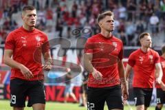 3. Liga; FC Ingolstadt 04 - SSV Ulm 1846; vor dem Spiel Mladen Cvjetinovic (19, FCI) Simon Lorenz (32, FCI)