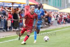 3. Liga; Testspiel; FC Ingolstadt 04 - 1. FC Heidenheim; Zweikampf Kampf um den Ball Linus Rosenlöcher (19, FCI) Traoré Omar Haktab (23 HDH)