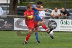 Kreisliga- Saison 2024/25- TSV Kösching - SV Hundszell - Stefan Härdl blau Hundszell - Sebastian Zabka rot Kösching - Foto: Meyer Jürgen