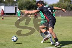 Bayernliga Nord - Saison 2024/25 - FC Ingolstadt 04 II - SV Fortuna Regensburg - Muhammed Atak (Nr.2 - FCI U21) - Schmitt Lucas grün Regensburg - Foto: Meyer Jürgen